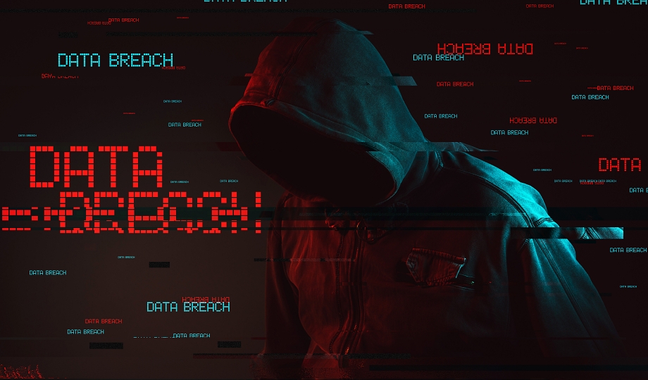 Data breach concept with faceless hooded male person, low key red and blue lit image and digital glitch effect