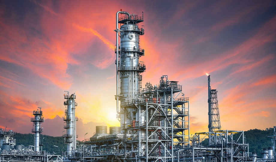 Close up Industrial view at oil refinery plant form industry zone with sunrise and cloudy sky