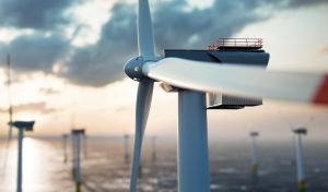 Offshore wind power and energy farm with many wind turbines on the ocean. Sustainable electricity production