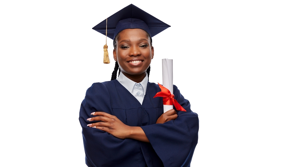 education, graduation and people concept - happy graduate student woman in mortarboard and bachelor gown with diploma over white background