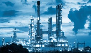 Oil refinery at twilight with blue color tone.