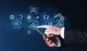 Hands of businessman using tablet computer with smart industry control over dark blue background. Concept of internet of things and hi tech