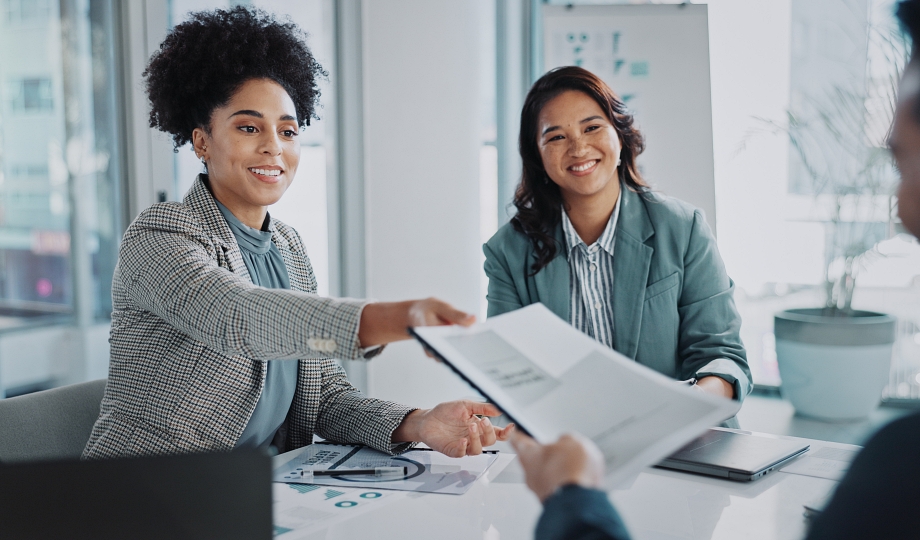 Business people, document and clients in meeting for proposal, collaboration and investment advice. Analyst, stakeholder or investor with portfolio for planning, review and opportunity or offer.